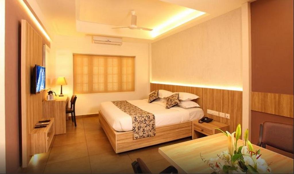 Hotel Luciya Palace Thrissur Quarto foto